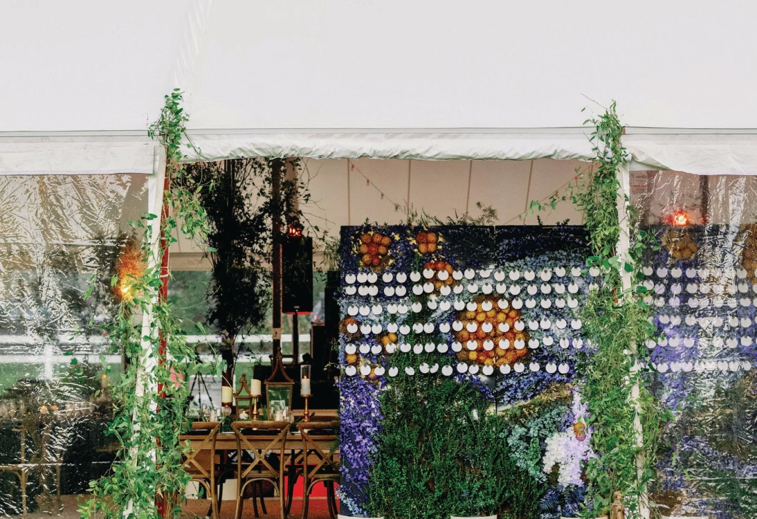 Taylor & Co. crafted a floral Starry Night for one couple's wedding escort board.