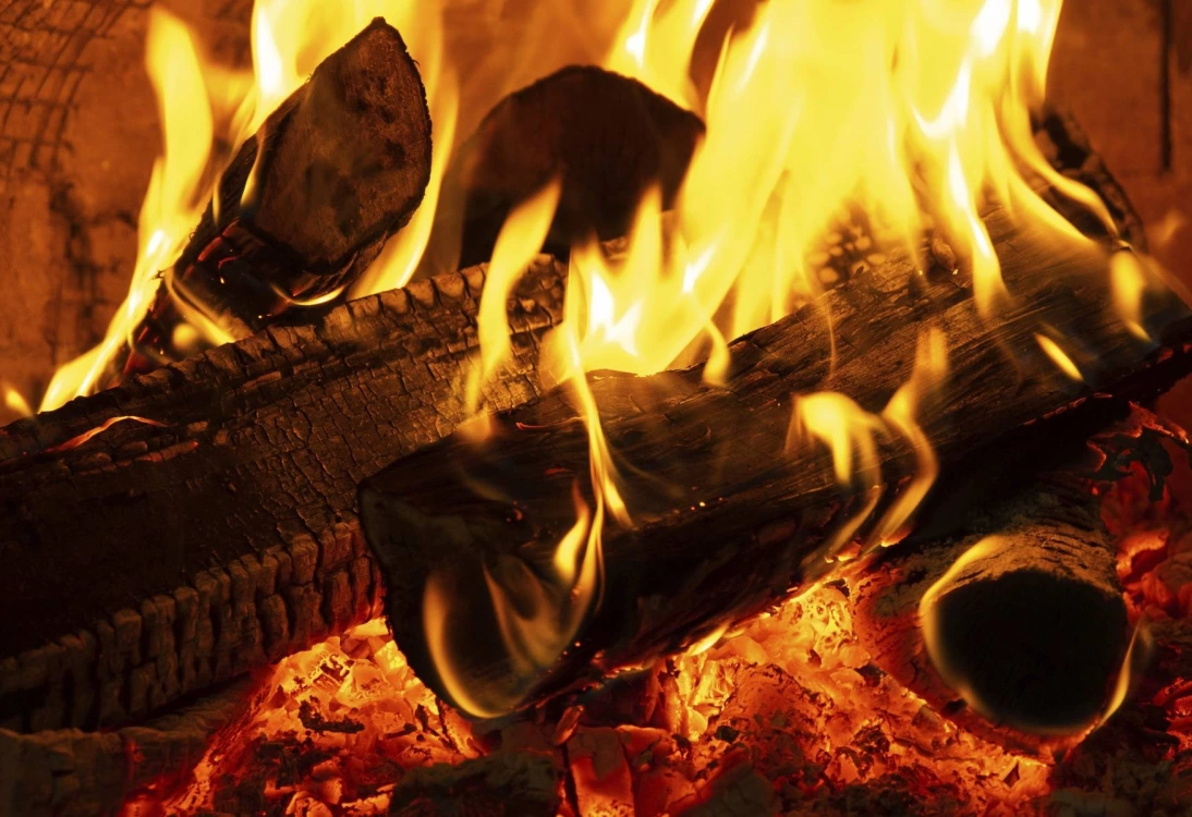 We asked our editors across the country which restaurants in their city have the best fireplaces, fire pits and more.