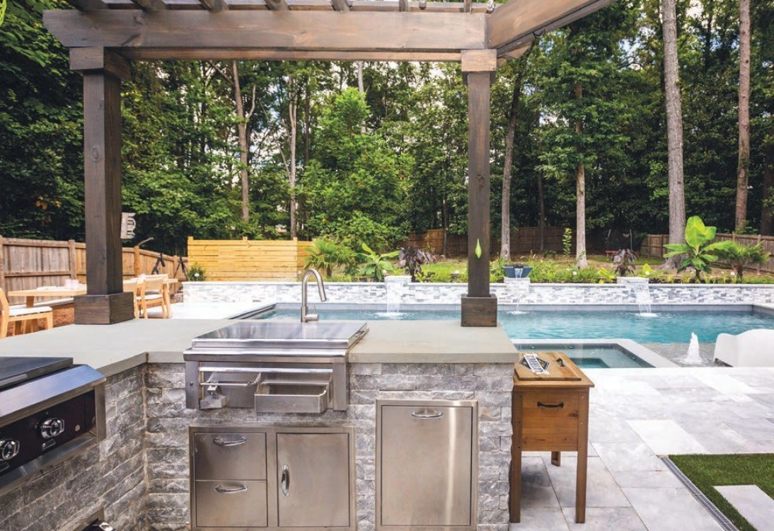 Through careful planning and innovative solutions, this Buckhead residence now offers a backyard oasis where indoor and outdoor living harmoniously blend.
