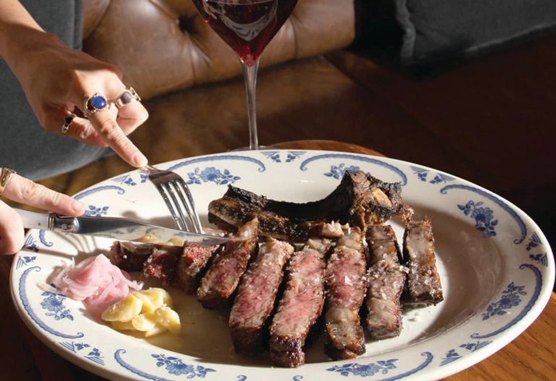 Elevated steakhouse favorites wow at Alpen Rose, from the porterhouse to the tomahawk.