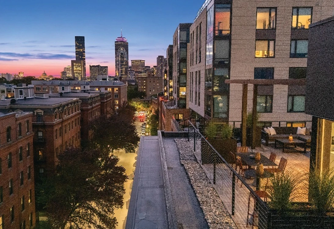 A penthouse on Albany Street in the South End with a private roof deck and a bespoke interior design by Planetta Design Group. See more of this property inside. PHOTO BY DRONE HOME MEDIA