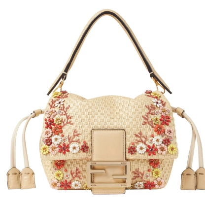 FENDI 2025 Summer Womenâs tote Fendi Mamma Baguette The Mamma Baguette was first released in the 1990s as a larger version of the iconic Baguette. For SS 25 this variation offers a casual, deconstructed version with enamel flowers and red bead embroidery that feels straight off the set of Mamma Mia. fendi.com PHOTO COURTESY OF THE BRAND