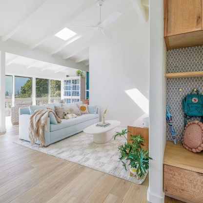 A once-closed-off space transforms into an open, hygge-inspired entryway with custom millwork PHOTO BY RJ GUILLERMO