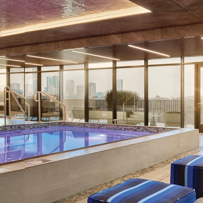 Members get an amazing view of the skyline and the West Bouldin Creek Greenbelt while enjoying Life Timeâs wet suite. PHOTO BY JUSTIN WALLACE PHOTOGRAPHY