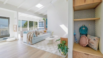 A once-closed-off space transforms into an open, hygge-inspired entryway with custom millwork PHOTO BY RJ GUILLERMO