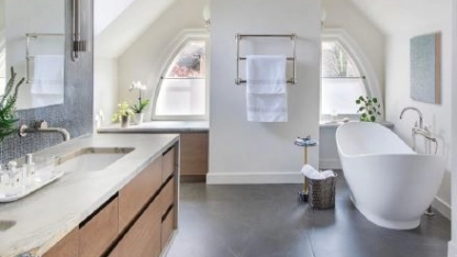 Cromática’s lounge sofa, adorned with iconic images and posters from Almodóvar’s films, is accented with the Pepa range of tables PHOTO COURTESY OF BRAND