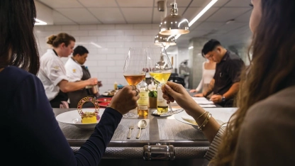 Guests savor an intimate evening at Hotel Waileaâs new Chefâs Table, where a five-course, seasonally-inspired menu is served in the kitchen. PHOTO BY JOHN TROXELL