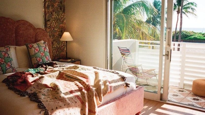 The interior rooms led by Nicolette Bernstein feature oversized velvet beds and botanical wallpaper PHOTO COURTESY OF CASA CAÃITA