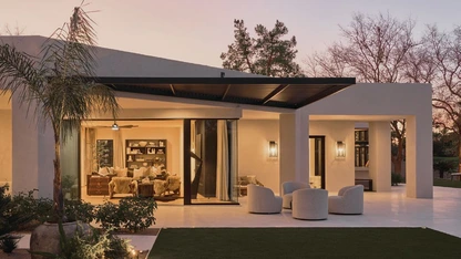 The homeâs extensive patio connects the indoors and exteriors seamlessly; Photographed by AUSTIN LARUE PHOTOGRAPHY