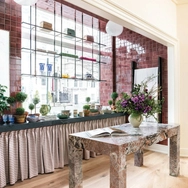 The light-filled space feels more like a private home than a retail space, inviting patrons to linger.