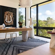 The study was a collaboration between Modern Luxury Interiors Florida, Jennifer Balcos Gallery and Bea Interiors Design, with tables by Bea Pernia, Faina lighting and objects and an Ashley Stark Home rug.  LIBERTAD RODRIGUEZ OTERO