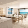 Modern open-concept living room with ocean views, featuring minimalist decor and elegant furnishings.