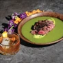 Sabina Mezcaleriaâs ribeye aguachile paired with the Ofrenda cocktail, featuring Sabinaâs Mezcal house reserve, a refined fusion of Vermouth Rosso and Holy Leaf infusion. PHOTO BY ANA HOLGUIN