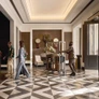 The bustling lobby of Four Seasons, One Dalton. PHOTO BY JOE THOMAS