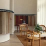 The exterior pool courtyard is framed by palazzo chaises by Jake Arnold for Crate and Barrel. Photographed by REID ROLLS