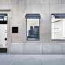 Storefront of Barton Perreira eyewear boutique with glass windows displaying glasses.