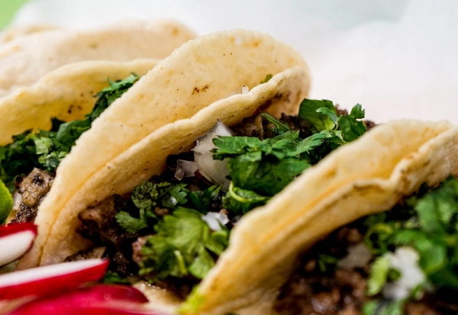 Nothing beats refueling with an aromatic and scrumptious taco truck right outside the clubs. Here is our list for the best late night taqueria trucks.