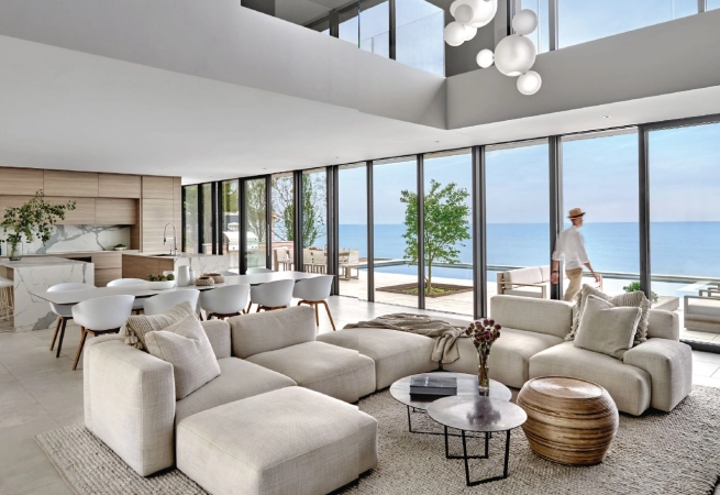 Among a developed stretch of homes along the lake in New Buffalo, Mich., dSPACE Studio creates a secluded contemporary oasis for a globe-trotting couple.