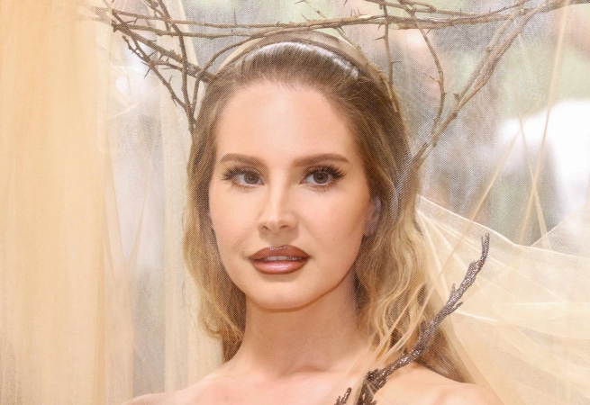 Lana Del Rey's attends the 2024 Met Gala themed "Sleeping Beauties: Reawakening Fashion" in an ethereal Alexander McQueen gown by Seán McGirr.