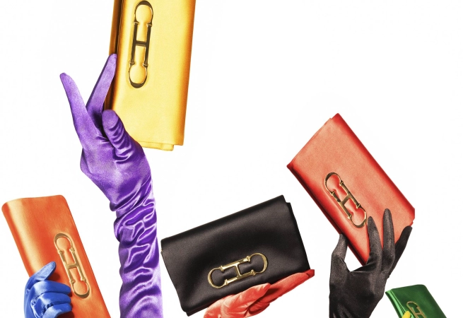 The word chic is synonymous with the House of Herrera, and the Initials Insignia Soft clutch adds a colorful finishing touch to that point.