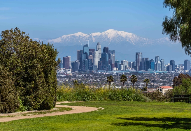 Downtown Los Angeles Skyline and Snow Capped Mountains