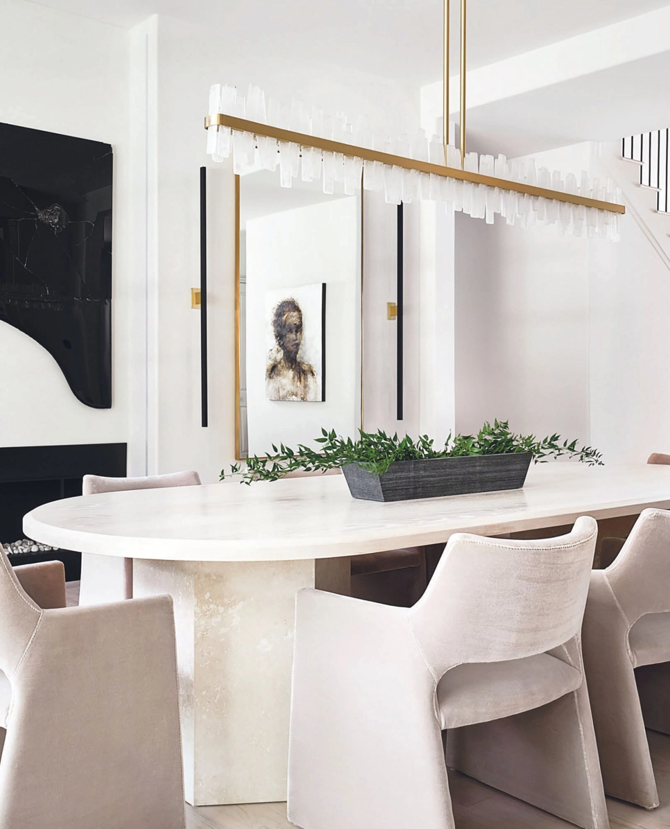 A custom-made White Oak pill-shaped top dining table perfectly complements the Mohair-covered modern dining chairs. photography by DANIEL GREEN ARCHITECTURAL + INTERIORS PHOTOGRAPHY