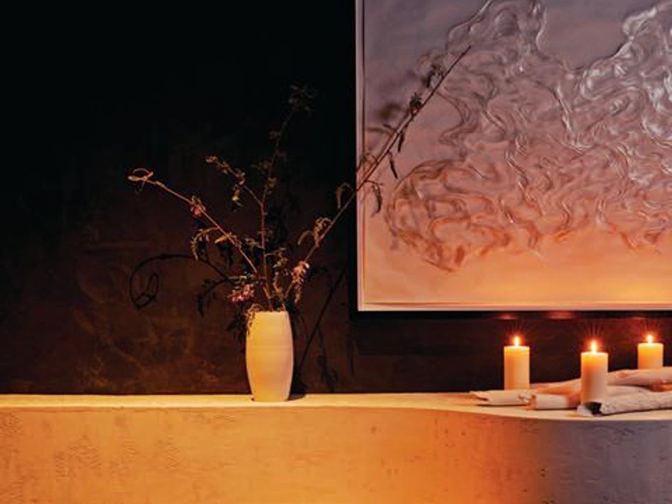 Soft lighting and restrained details shape the restaurant's quietly atmospheric setting. PHOTO BY ANDREW THOMAS LEE