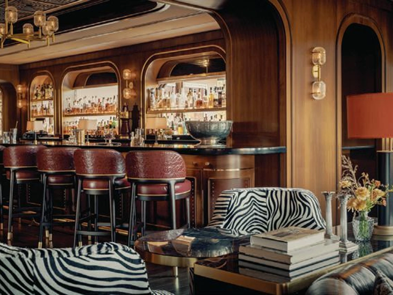 The lounge employs a layered material composition that balances refinement with a strong sense of place. PHOTO BY AMAURY LAPARRA, COURTESY OF TIHANY DESIGN