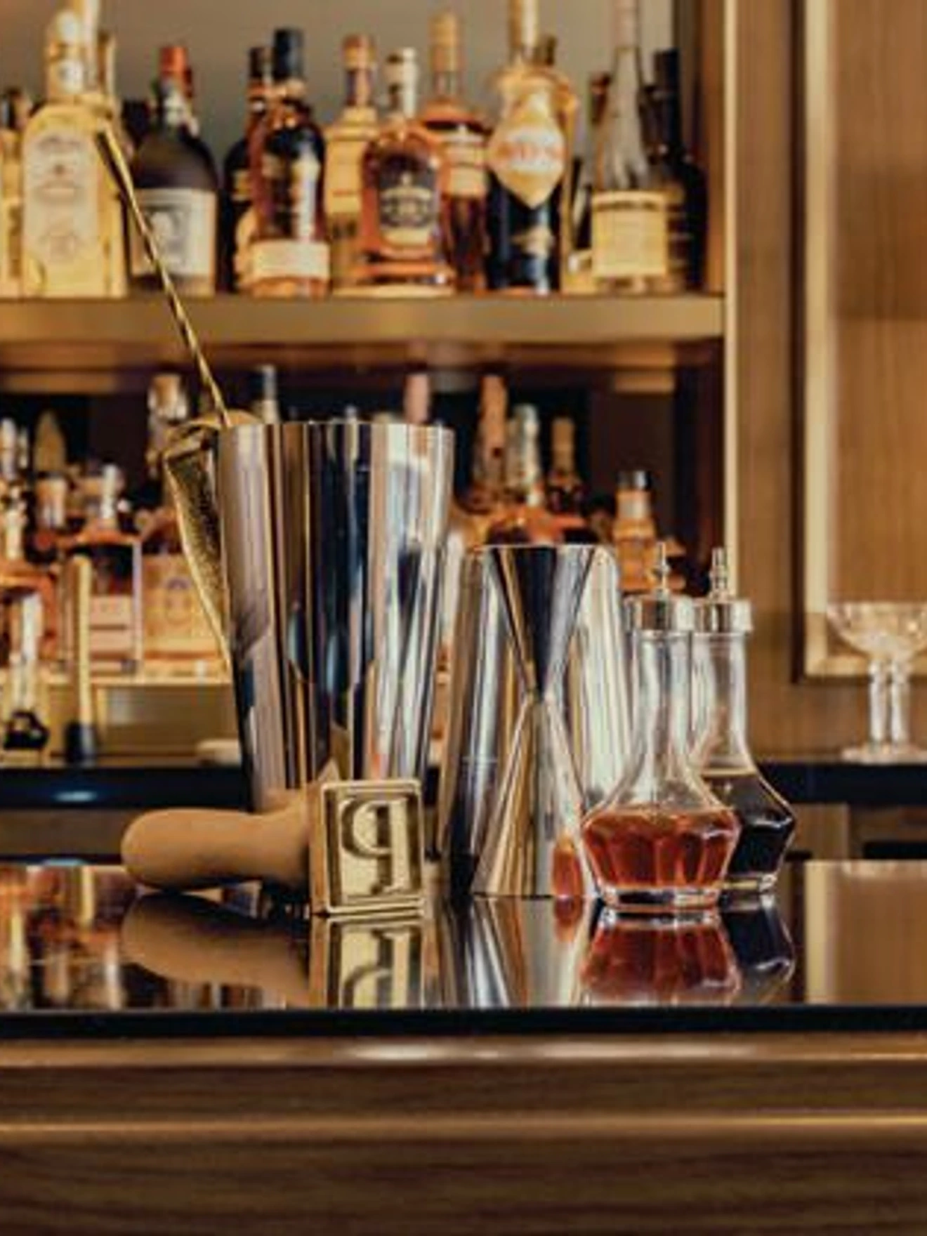 The bar area pays homage to the Penrosesâ adventurous spirit and global travels. PHOTO BY AMAURY LAPARRA, COURTESY OF TIHANY DESIGN