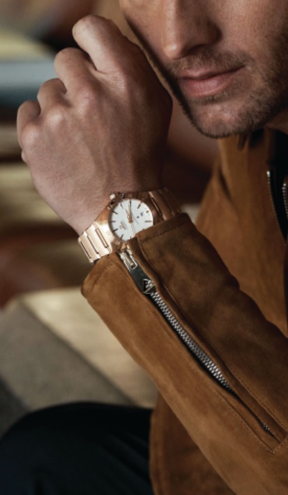 “My wife has an Omega, and now she gets it. Now she wants like two more.” Here, Hartley wears the Constellation 39 mm by Omega. PHOTO COURTESY OF OMEGA