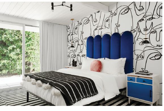 The guest bedroom features Femme wallpaper by DropIt Modern PHOTOGRAPHED BY LANCE GERBER