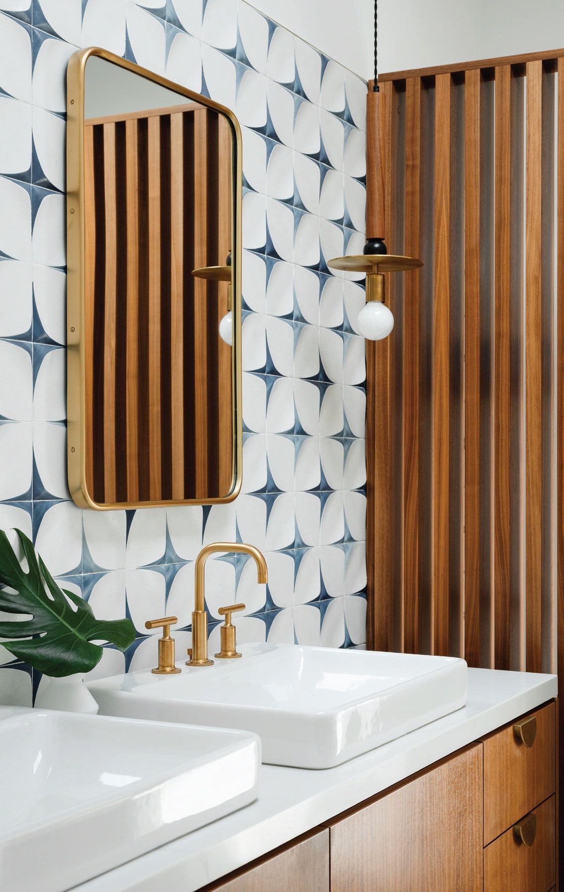 The primary bathroom boasts a bold backsplash by Trifecta Tile Concepts. PHOTOGRAPHED BY LANCE GERBER