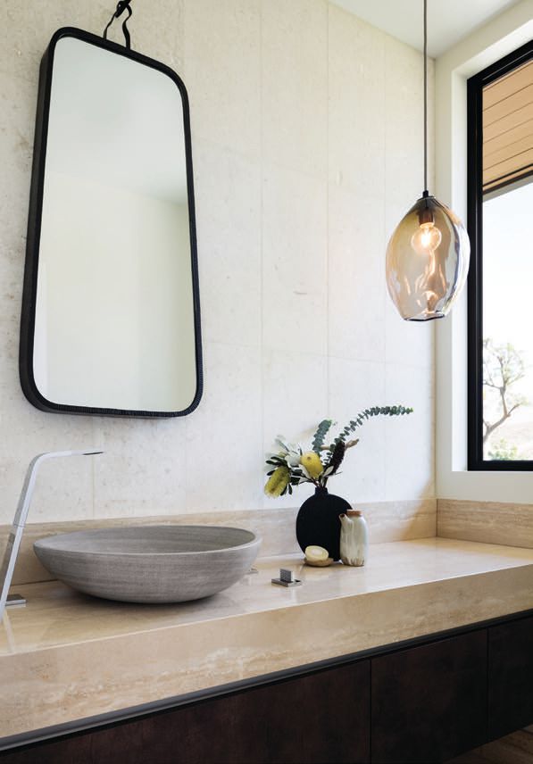 Dornbracht counter faucets are featured in the powder room and throughout Photographed by Ethan Tweedie