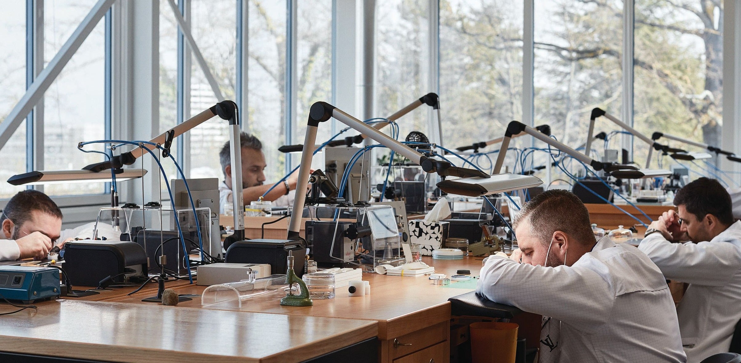 Master artisans working in Louis Vuitton’s Haute Horlogerie atelier located outside of Geneva PHOTO COURTESY OF LOUIS VUITTON