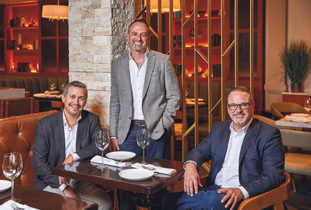 Grove Bay Hospitality partners Eddie Acevedo, Ignacio Garcia-Menocal and Francesco Balli PHOTO COURTESY OF GROVE BAY HOSPITALITY GROUP