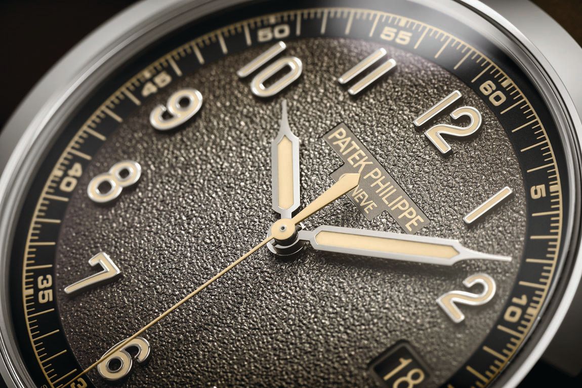 The textured grey dial highlights the gold applied numerals. PHOTO COURTESY OF PATEK PHILIPPE