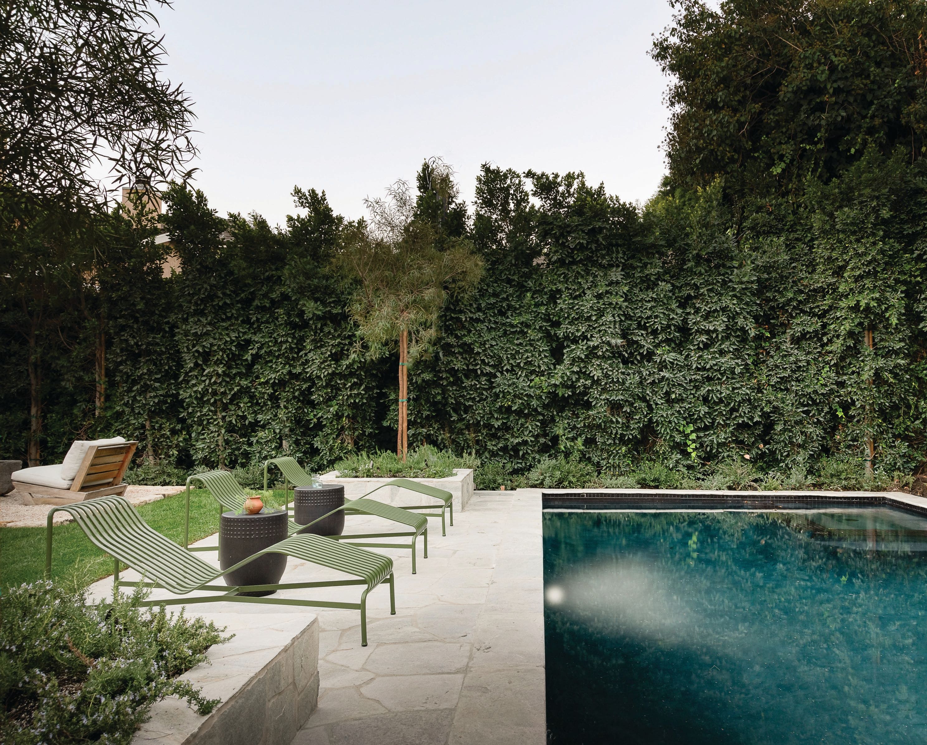 Similar to the interior spaces, the team wanted the outdoor areas to feel special. “The Palisades chaise loungers by Hay added that simple yet impactful moment out by the pool,” shares Brady. PHOTOGRAPHED BY TODD GOODMAN