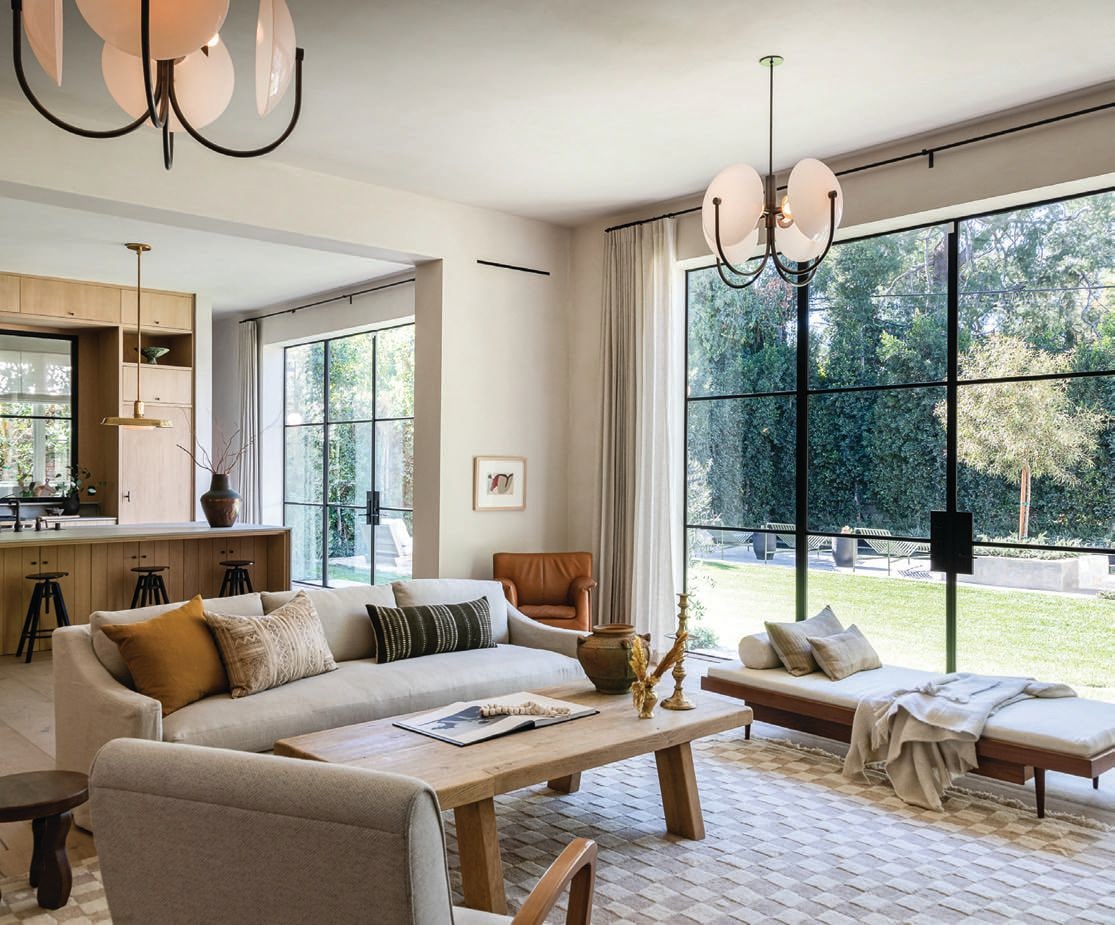 Warm touches of chestnut leather, textured soft textiles, aged oak and ancient terra cotta mingle in the living room PHOTOGRAPHED BY TODD GOODMAN