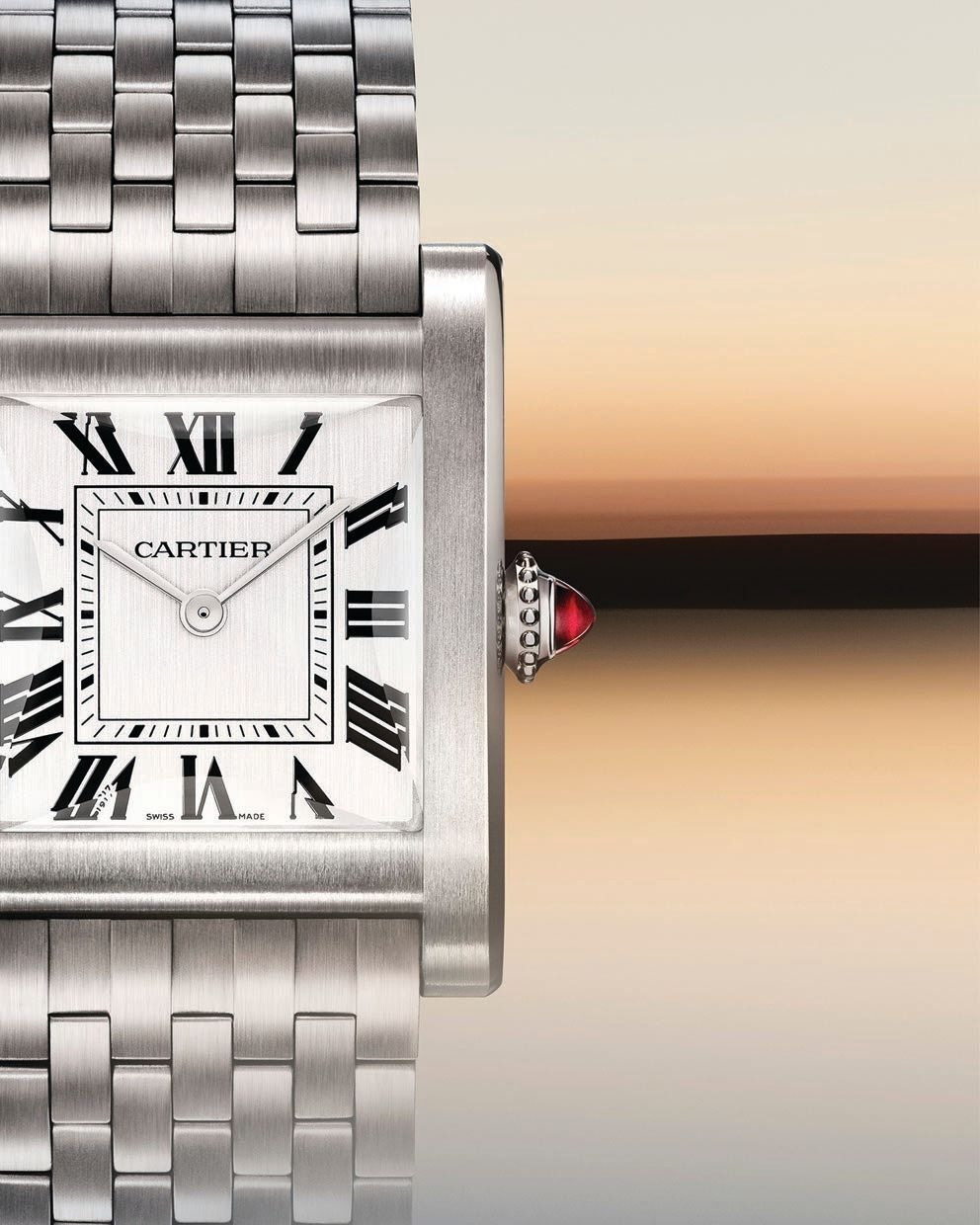 A limited edition of 20 numbered pieces is set with brilliant-cut diamonds, featuring an alligator strap in two shades of blue with a brilliant-cut diamond on the winding crown. PHOTO COURTESY OF CARTIER