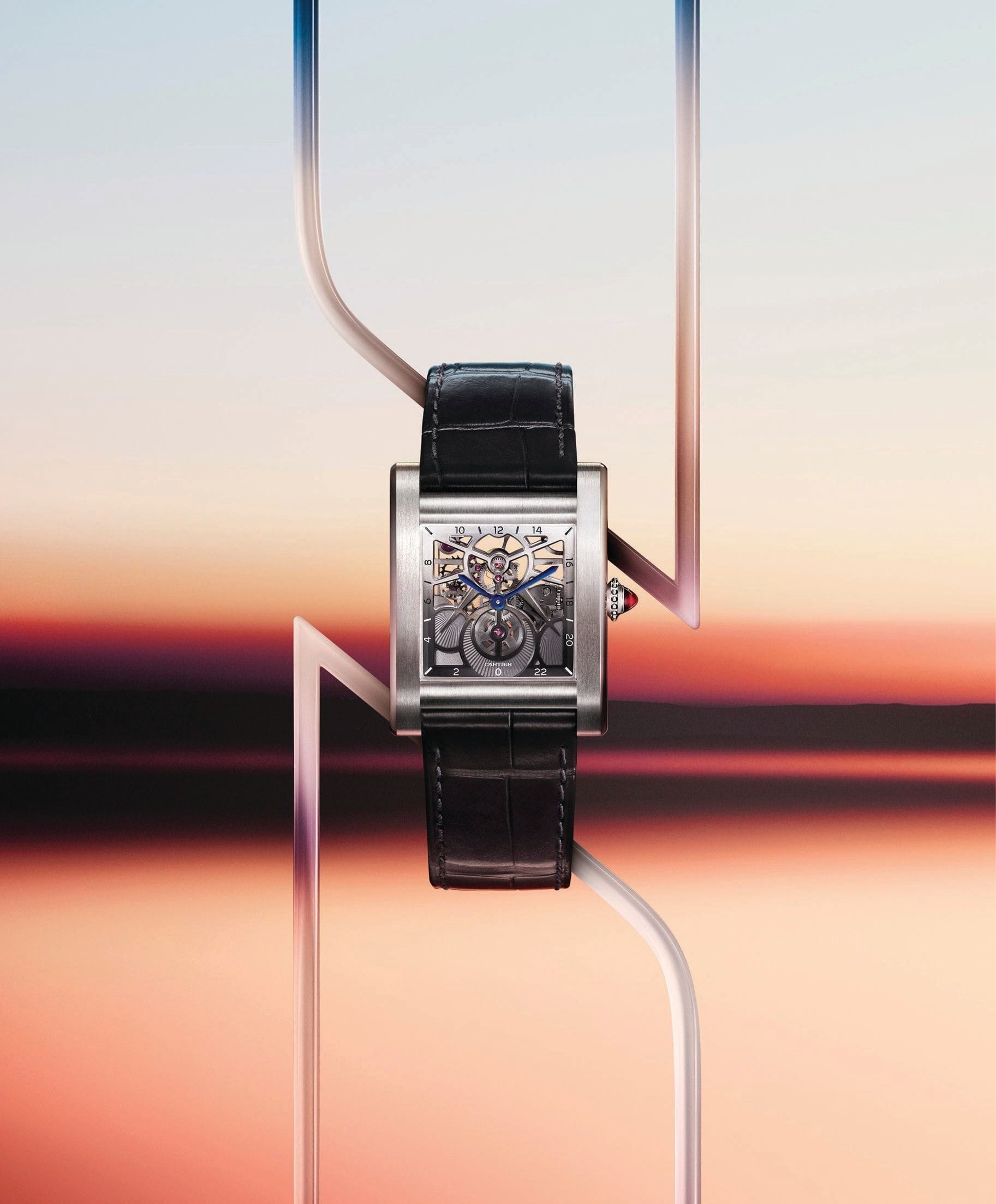 Cartier has added a skeleton movement to this iconic model, accompanied by a 24-hour complication marked by a sun and crescent moon that is also skeletonized. PHOTO COURTESY OF CARTIER