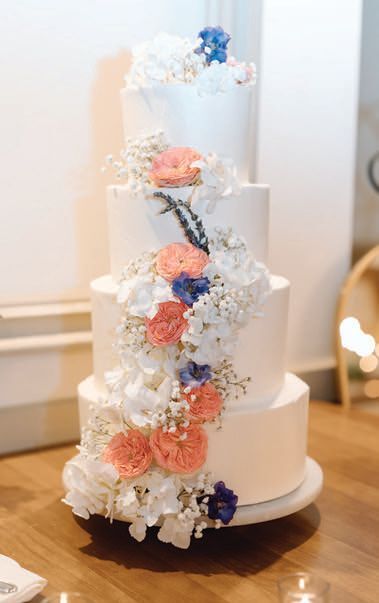 The cake had alternating flavors of vanilla almond and 				chocolate.