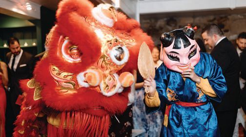 Lion Dancers performed in a nod to the bride’s 				Chinese roots