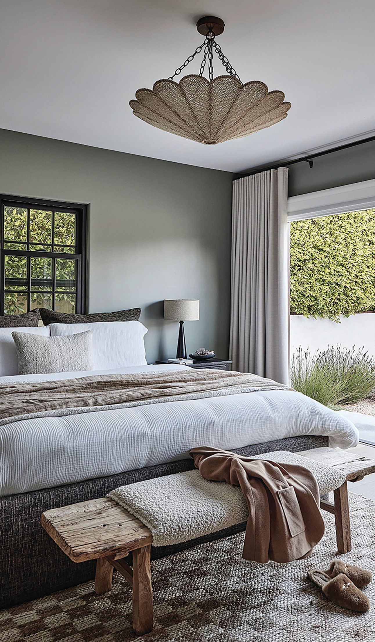 Overlooking the 				backyard, the 				primary bedroom 				has a strong 				connection to 				the outdoors. PHOTOGRAPHED BY JENNA PEFFLEY