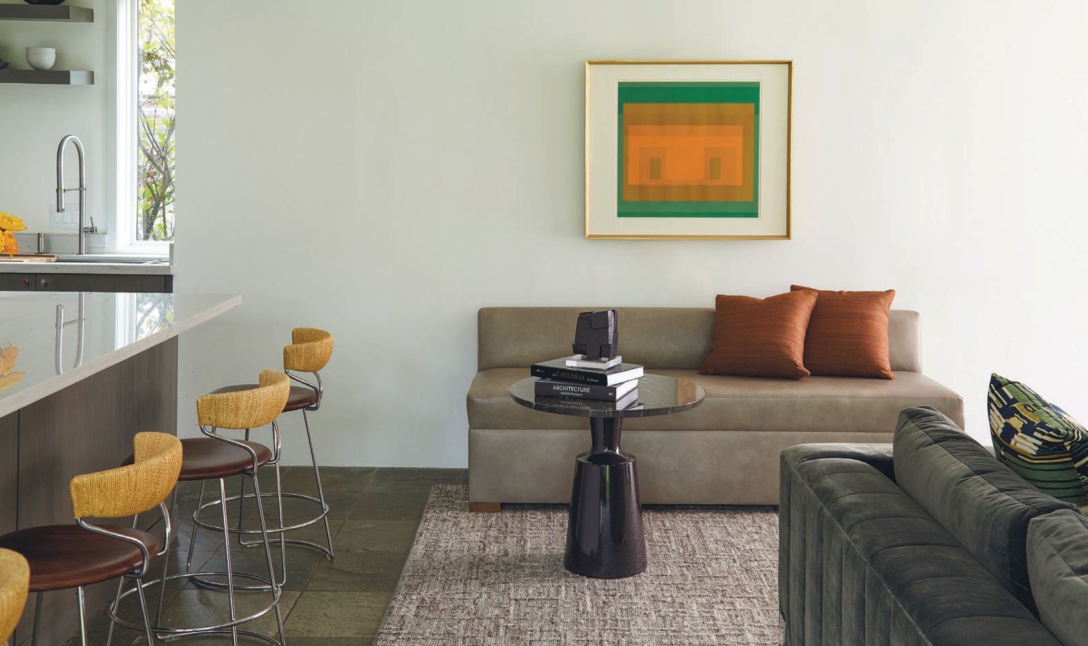 Josef Albers “I-S Va 6 (from the Six Variants series” (1969 screenprint in colors on Arches paper) compliments with a pop of color paired with the McGuire Danish cord swivel counter stools PHOTOGRAPHY BY KRIS ELLIS; STYLING BY MICHELLE AVIÑA