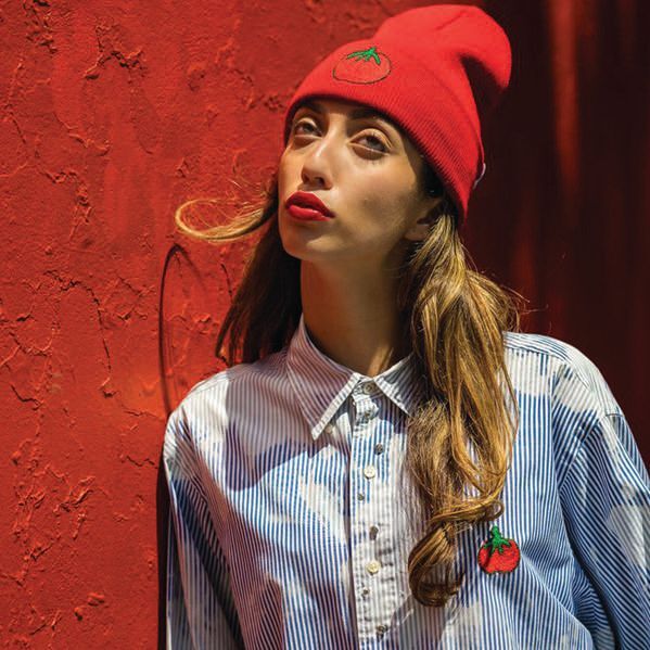 a beanie and shirt from Project Paulie. PHOTO: COURTESY OF M. FLYNN