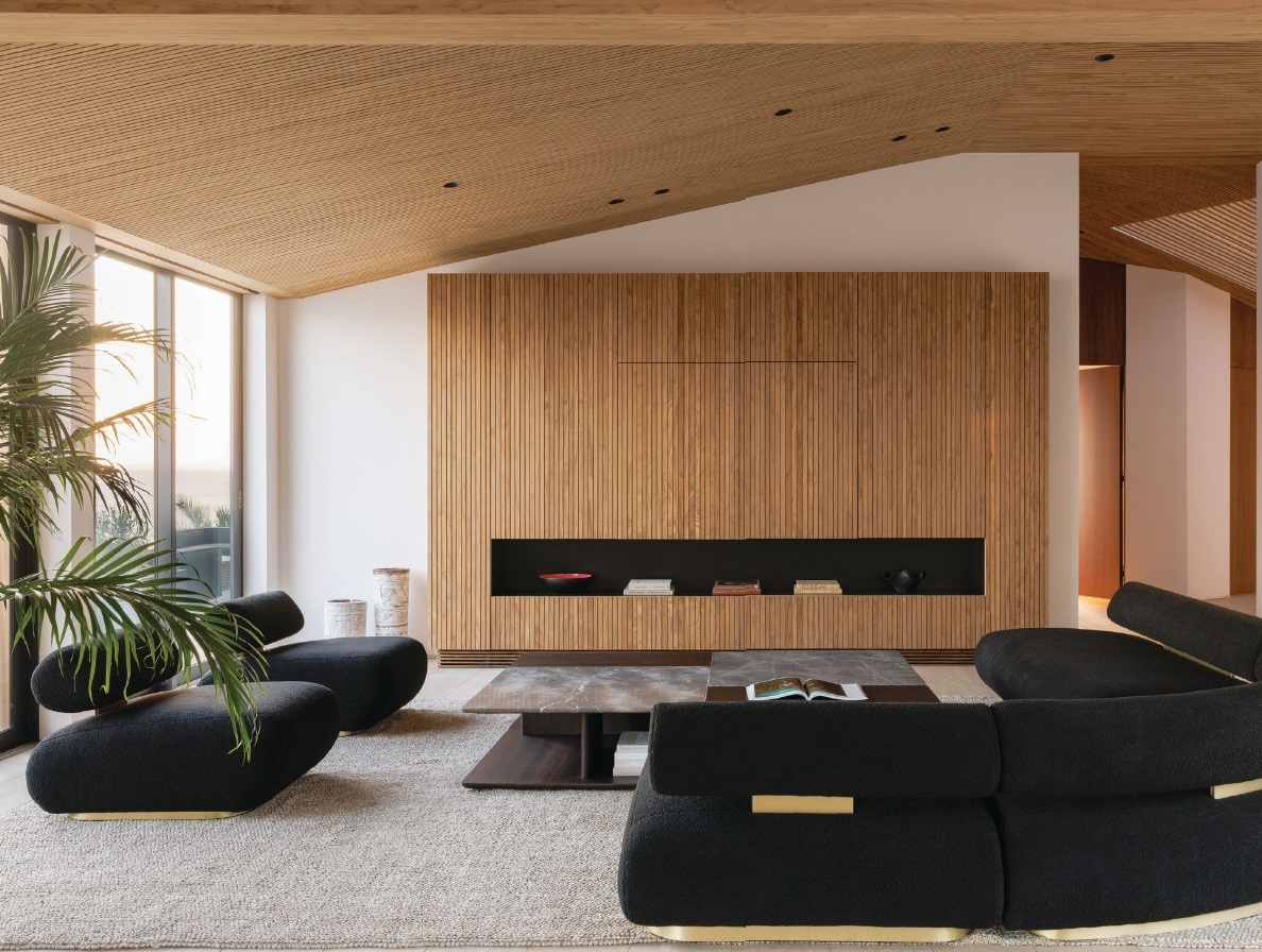 “A highlight was the moment when the wave-inspired ceiling was completed,” says Goineau, who calls out the living room as a favorite area. “It transformed the space and perfectly captured the essence of the home.” PHOTOGRAPHED BY VIRTUALLY HERE STUDIOS
