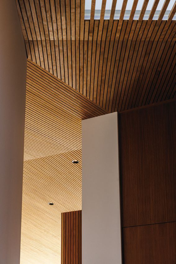 The ceiling is constructed from thermally modified ash wood PHOTOGRAPHED BY VIRTUALLY HERE STUDIOS