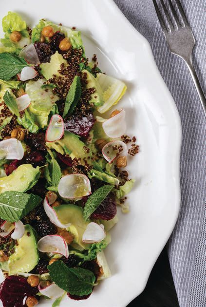 The City Salad with little gem lettuce, avocado, blueberries, quinoa, crispy chickpeas and tarragon vinaigrette. PHOTO BY JASON PERRY