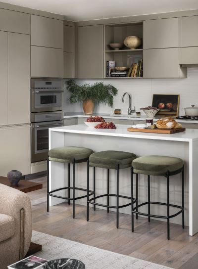 The kitchen features stools from Sunpan. photographed by JENN VERRIER