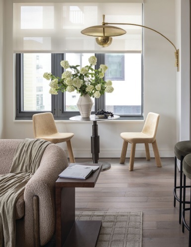 The living room blends modernity, softness and warmth to balance hard materials. photographed by JENN VERRIER